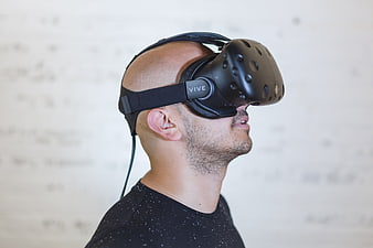 Man Wearing HTC Vive Virtual Reality Headset in Profile
