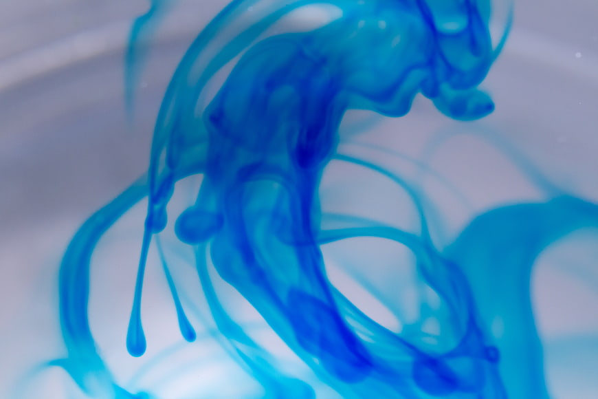 Abstract Blue Ink Swirling in Water