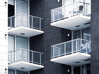 Modern Apartment Building Facade with Glass Balconies
