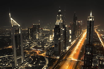 Night Time Lapse of Dubai Skyline and Highway Traffic