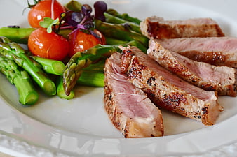 Sliced Grilled Pork Loin with Asparagus and Tomatoes