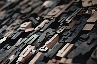 Close-up of vintage wooden letterpress printing blocks