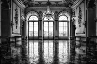 Grand black and white interior of a historic palace hall