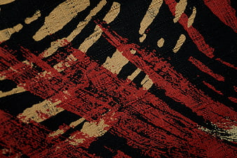 Abstract Red Black and Beige Woven Fabric Texture