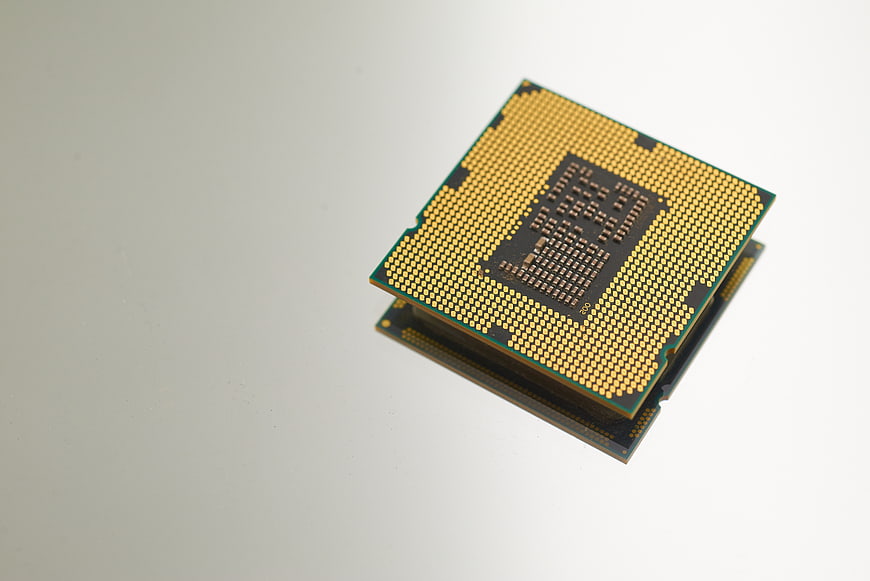 Close-up of computer processor chip on white background