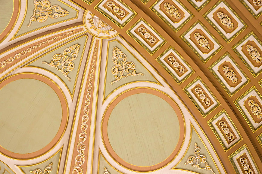 Ornate Baroque Ceiling with Gold and Green Decorative Patterns