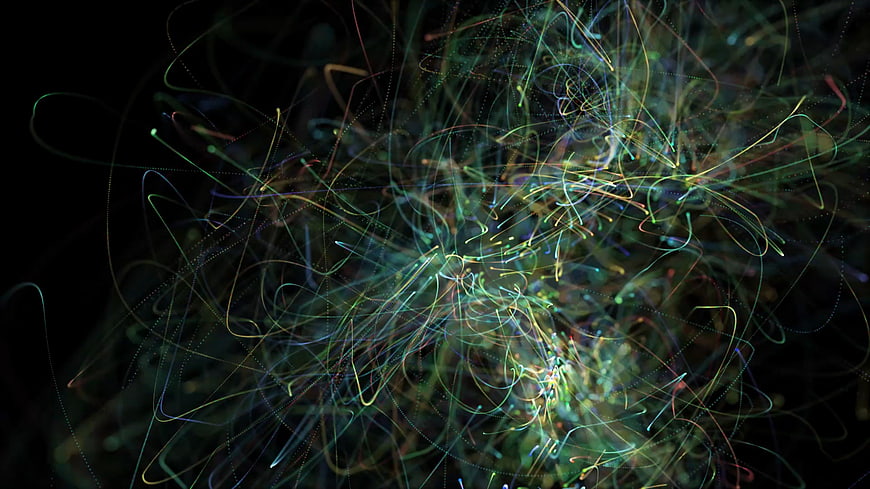 Abstract colorful light trails on black background