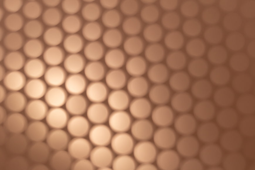 Abstract Blurred Bokeh Background with Warm Bronze Circles