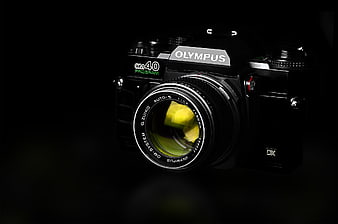 Vintage Olympus OM40 Camera on Black Background