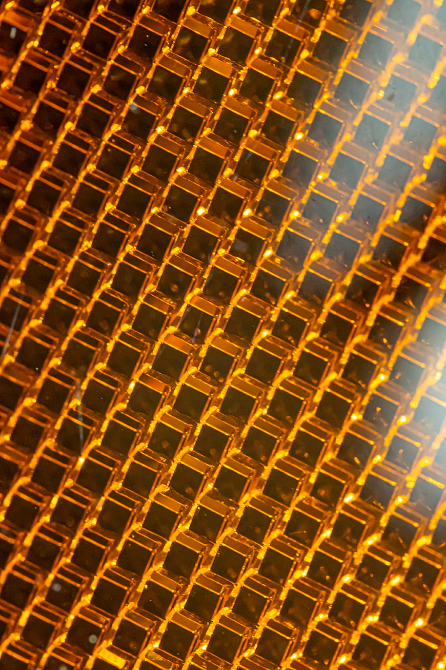 Abstract Glowing Amber Grid Pattern Texture