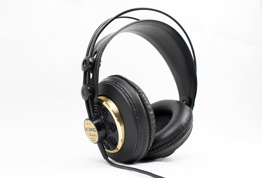 Black and Gold Studio Headphones on White Background