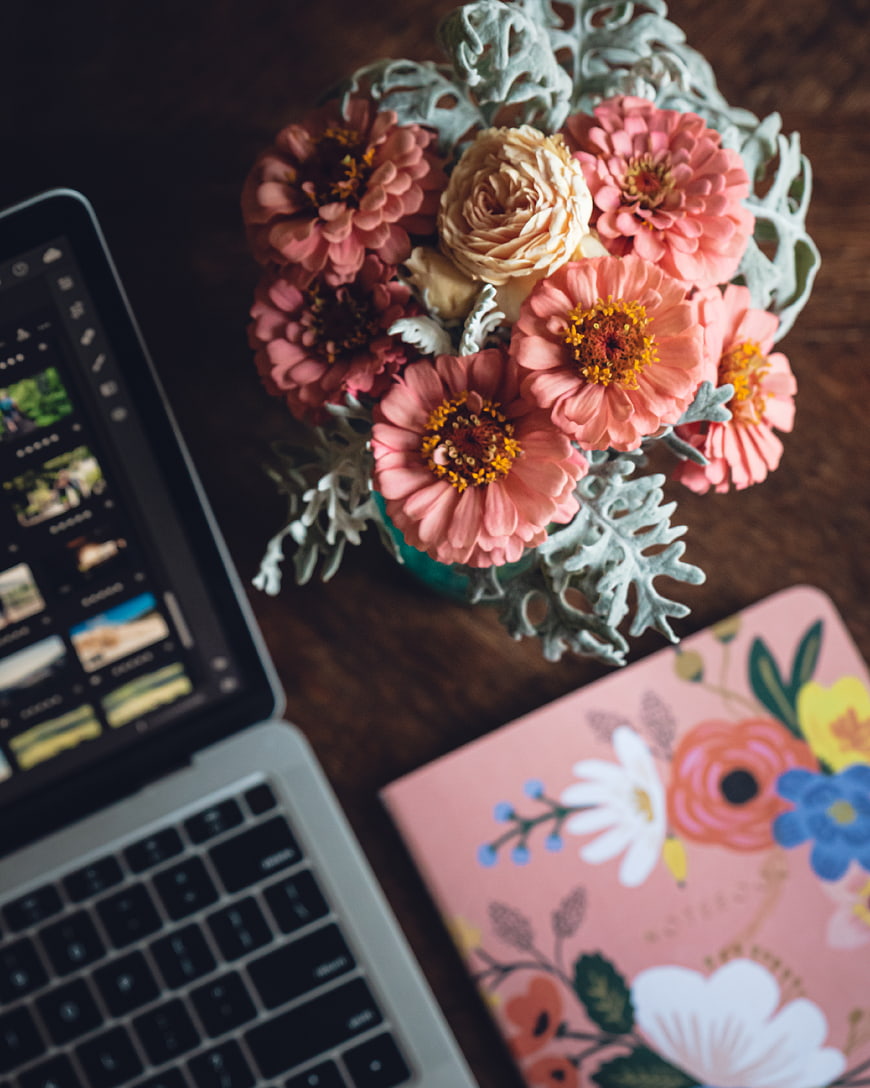 Pink Zinnia Bouquet on Wooden Desk with Laptop and Notebook