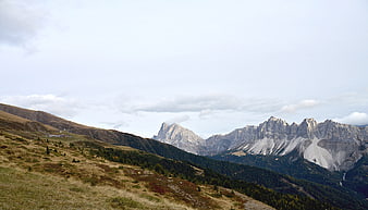 Panoramic Dolomites Mountain Landscape with Grasslands