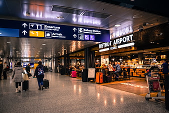 Helsinki Airport Terminal Interior with Bistro and Travelers