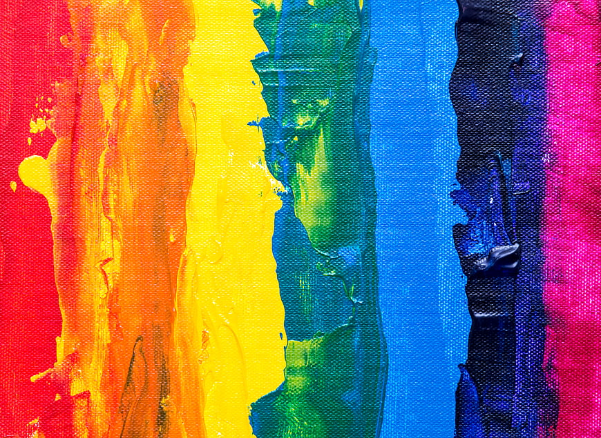 Vibrant Rainbow Acrylic Paint Texture on Canvas