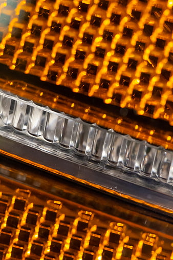 Close-up of glowing amber automotive turn signal light