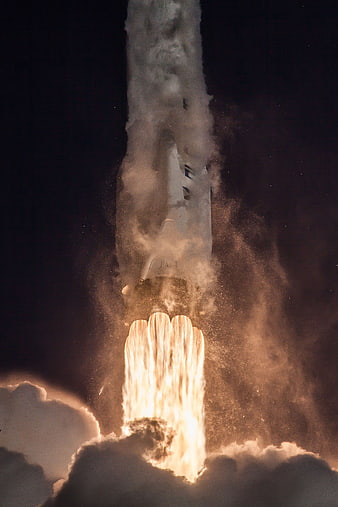 Space Shuttle Launching Into Night Sky With Fire