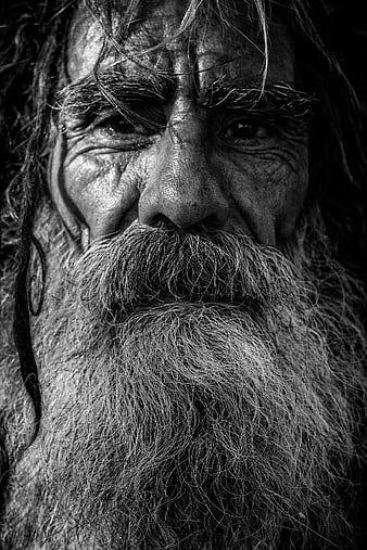 Close-up Black and White Portrait of Elderly Man with Beard