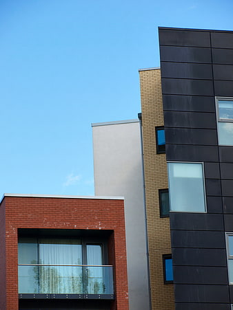 Modern Apartment Buildings with Brick and Dark Facades