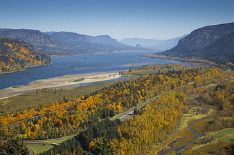 Aerial View of Autumn Landscape with River and Golden Forest