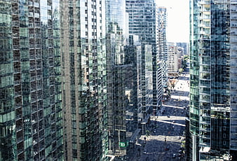 High-angle view of modern glass skyscrapers in downtown city