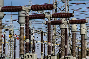 High Voltage Electrical Substation with Insulators and Power Lines