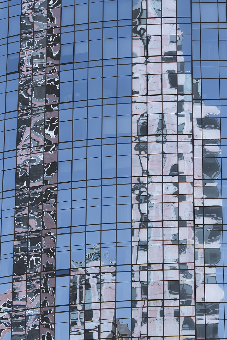 Abstract Reflections on Modern Glass Skyscraper Facade