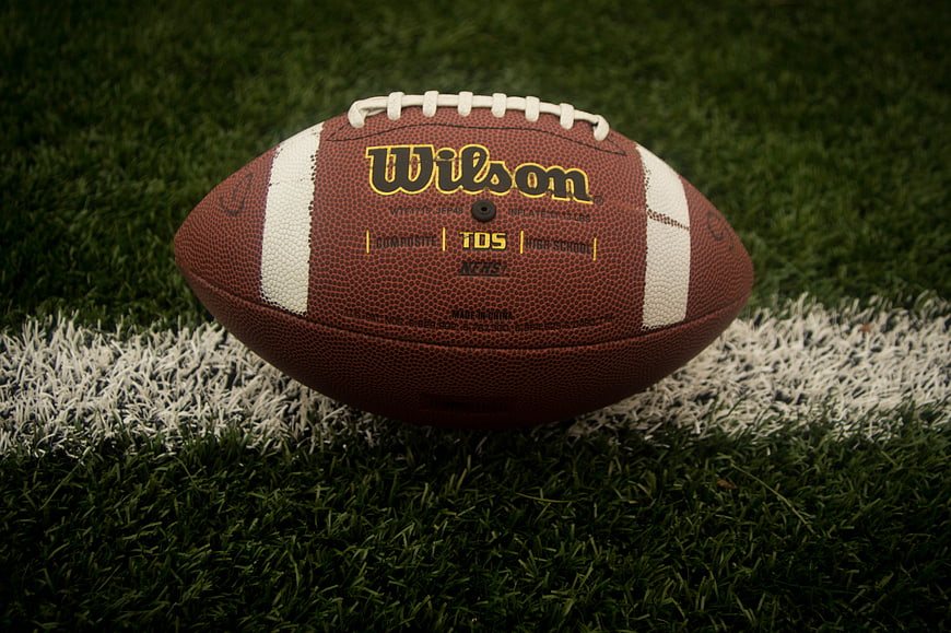 Wilson American Football on Artificial Turf Field