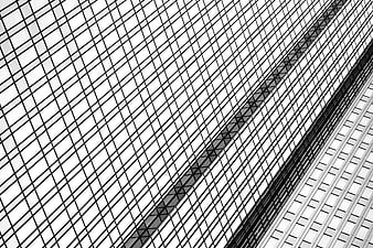 Black and white abstract modern building facade grid pattern
