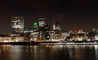 London City Skyline at Night with River Thames Reflections
