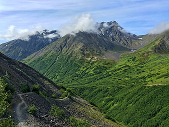 Scenic Mountain Landscape with Hiking Trail and Clouds