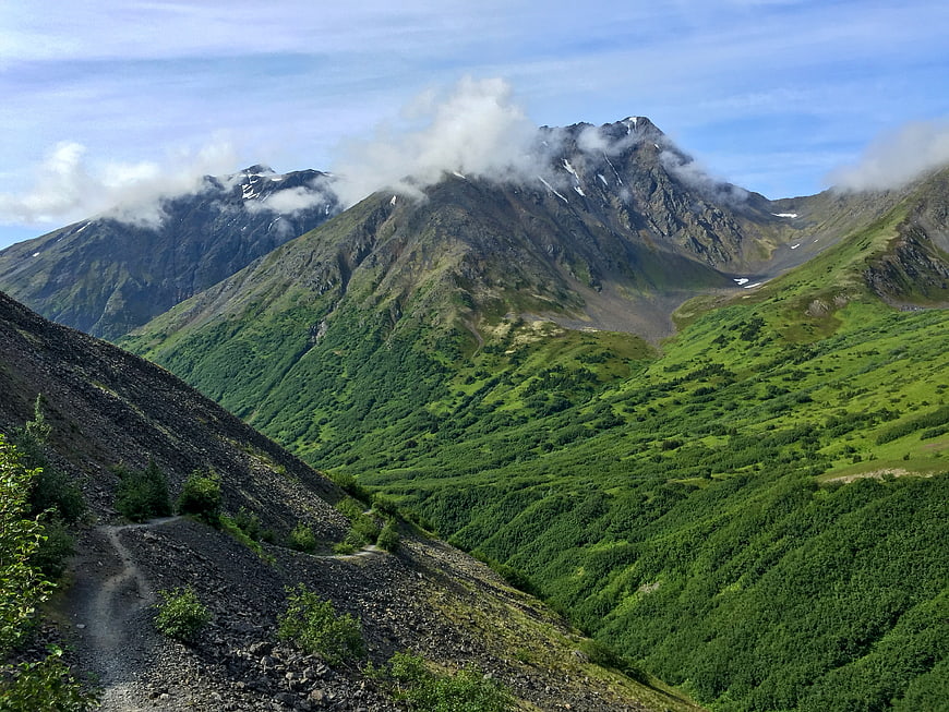 Scenic Mountain Landscape with Hiking Trail and Clouds