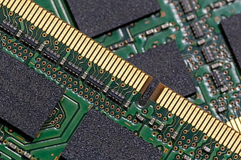 Close-up of green RAM memory module circuit board