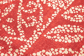 Red fabric with white dotted pattern texture background