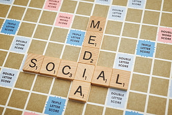 Social Media Concept on Scrabble Board with Wooden Tiles