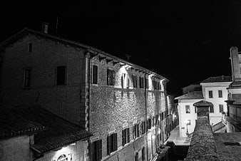 Black and white night view of historic San Marino architecture