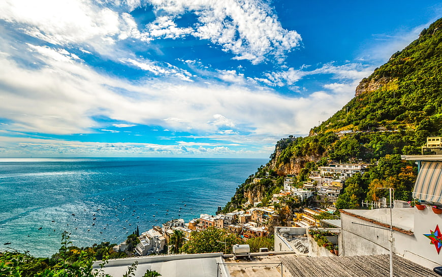 Aerial View of Colorful Coastal Village on Cliffside