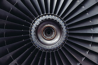 Close-up of a jet engine turbine fan blades