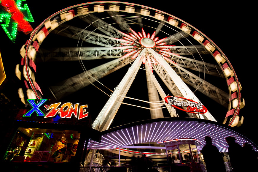 Illuminated Ferris Wheel at Night Amusement Park