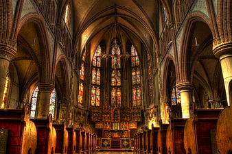 Gothic Church Interior with Stained Glass Windows and Altar