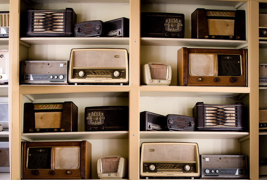 Vintage Retro Radios on Wooden Shelves Collection
