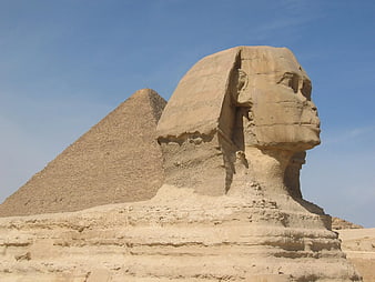 Great Sphinx of Giza with Pyramid Background in Egypt