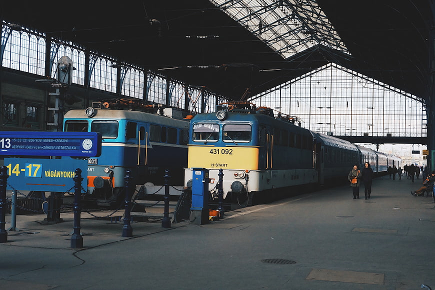 Vintage Blue and Yellow Locomotives at Train Station Platform