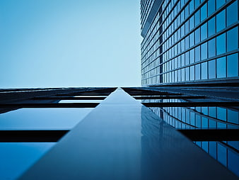 Low Angle View of Modern Glass Office Building