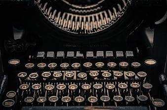 Close-up of vintage black typewriter with AZERTY keys