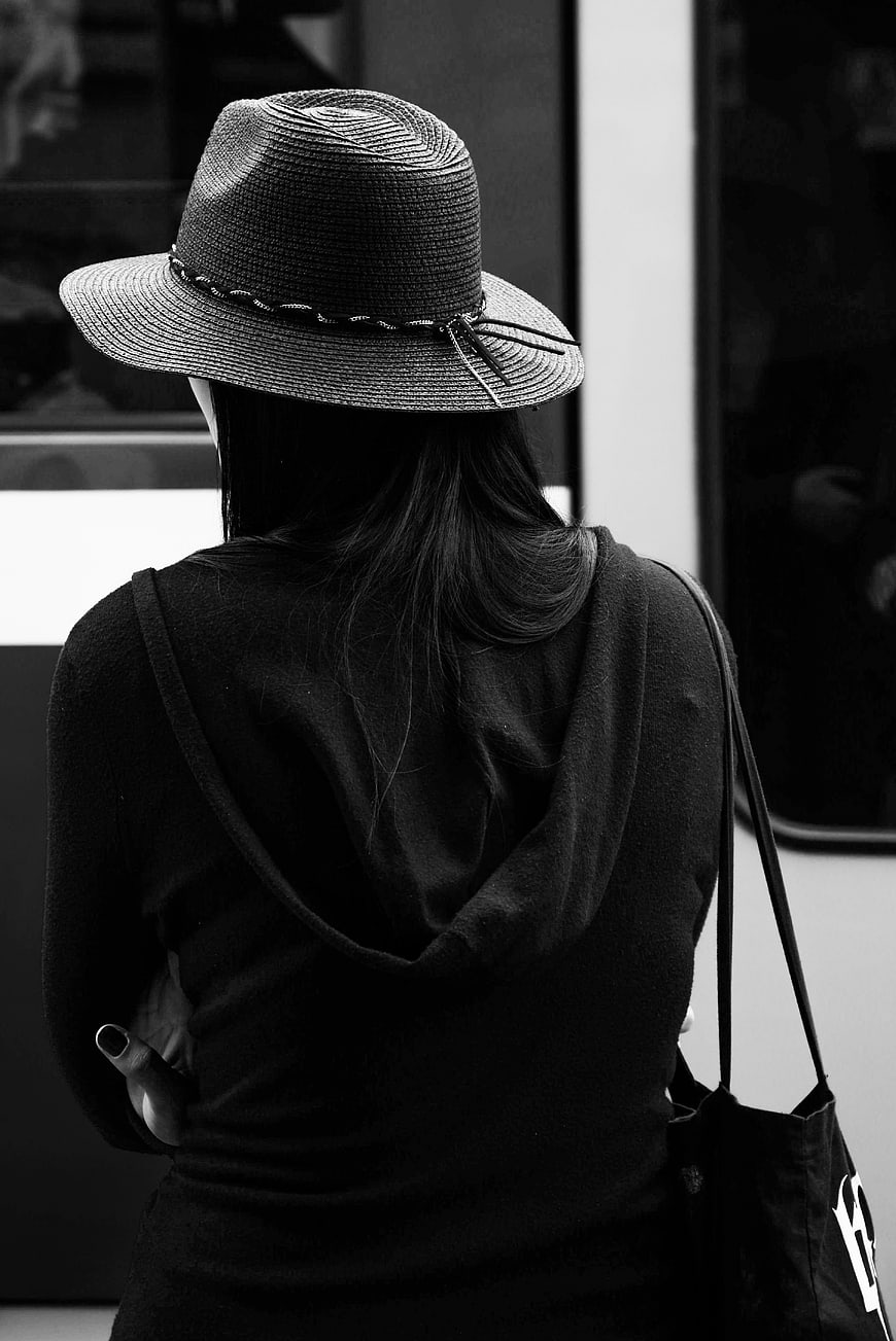 Woman in Straw Hat from Behind in Black and White