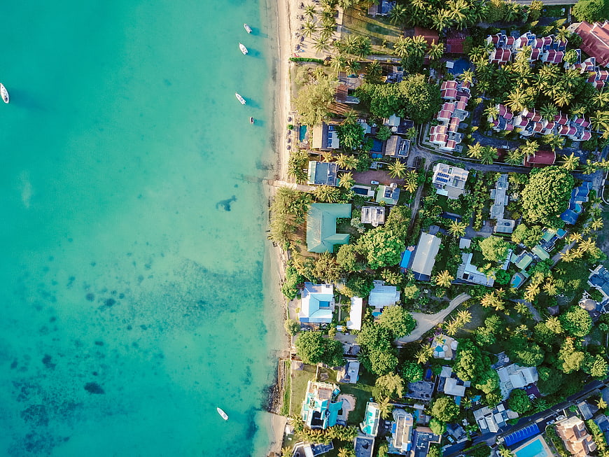 Aerial View of Tropical Beach Resort with Turquoise Water