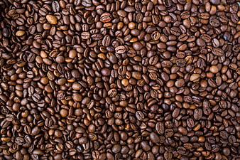 Close-Up Texture of Roasted Coffee Beans Background
