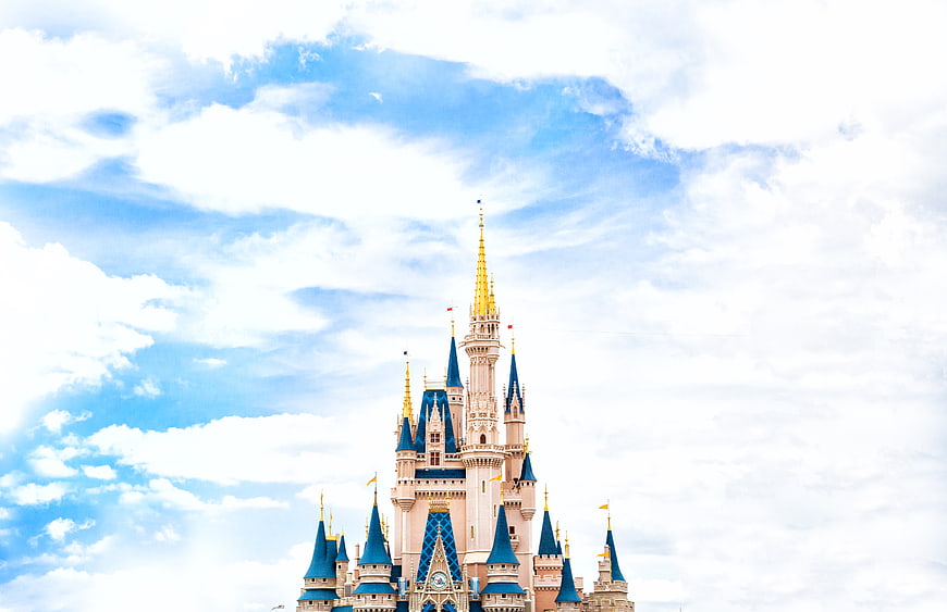 Disney Castle Against Blue Sky with Clouds
