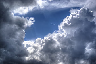 Dramatic Blue Sky with Fluffy White Clouds